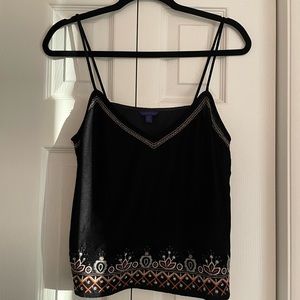 Black top with details at bottom.